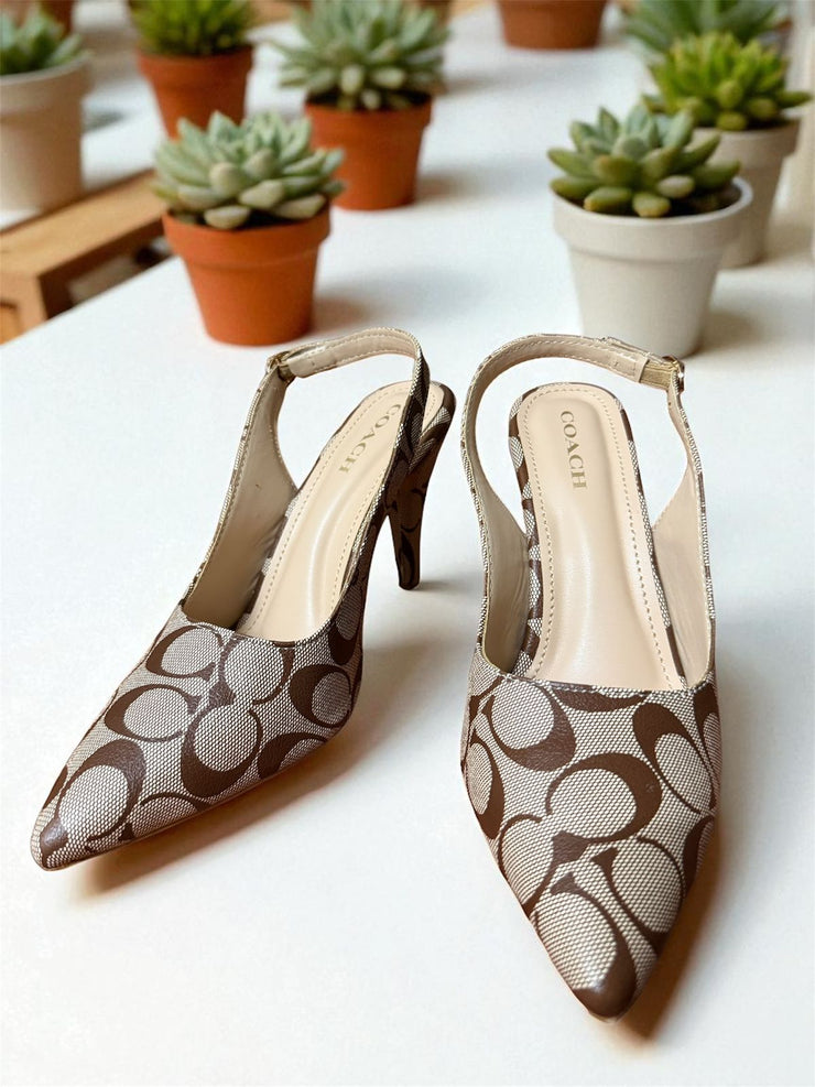 Latest Coach Heels 👠