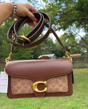 Coach Tabby Shoulder Bag 26 in Signature Canvas.
