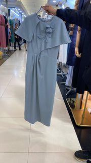 Elegant cape-shoulder midi sheath dress with floral applique