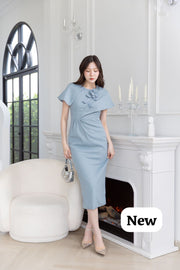 Elegant cape-shoulder midi sheath dress with floral applique